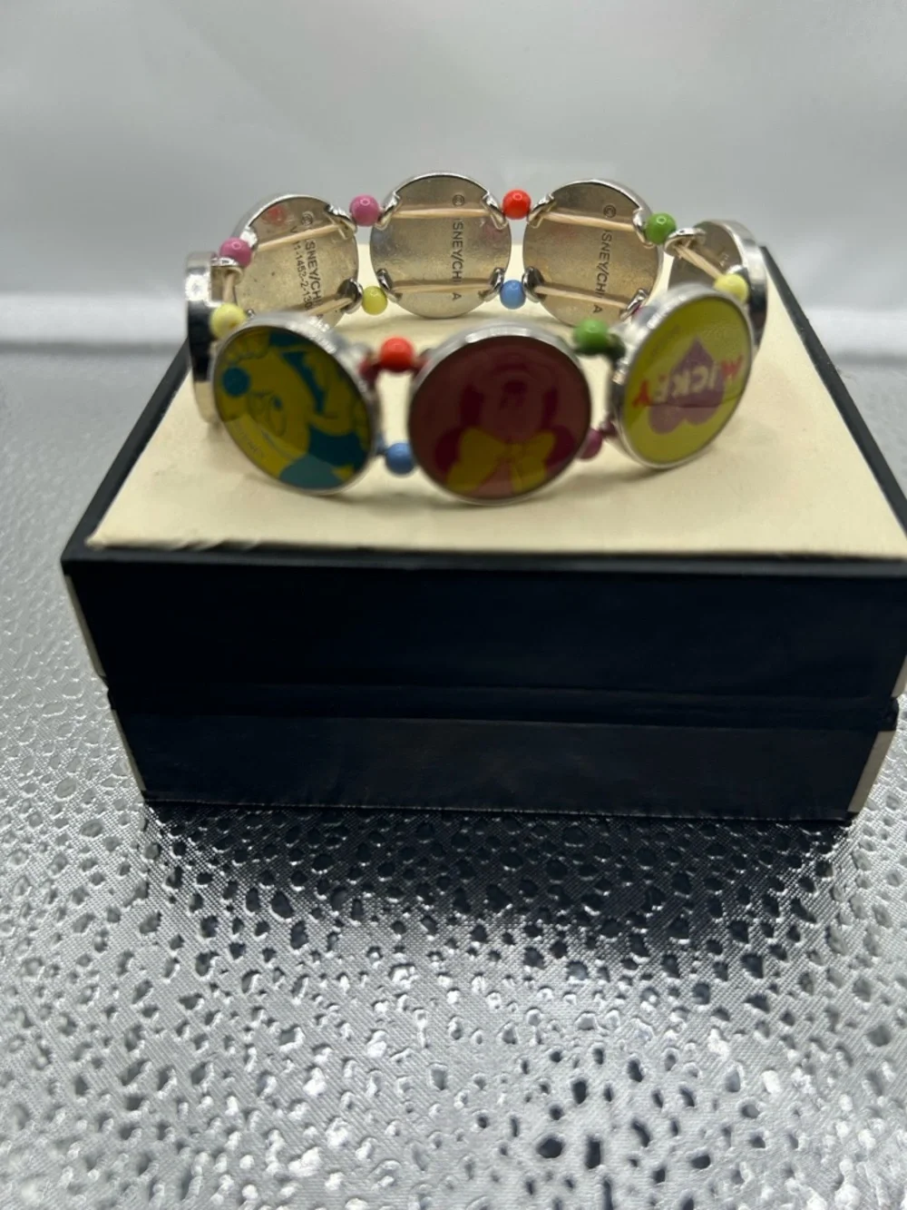 Disney character charm bracelet stretch multicolored novelty collectible